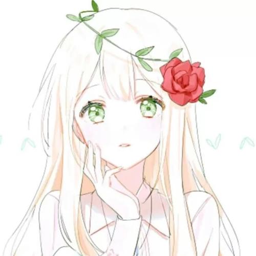 手冢理美